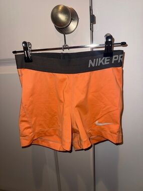 Nike Pro light Orange Women's Training Shorts with Gray Waistband